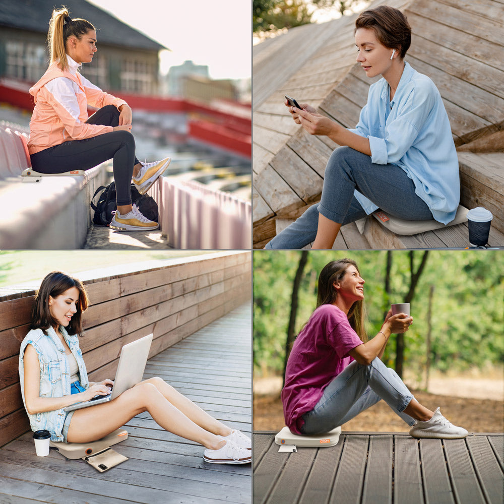 Four women sit outside on benches or wooden surfaces, using electronic devices or drinking coffee, each relaxing on the COZY Cordless Heated Seat Pad - JORD for extra comfort.