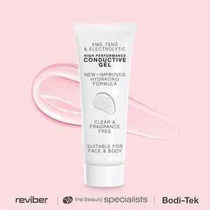 The EMS, TENS & Micro-Current Toning Conductive Gel 85ml stands upright on a pink background with a smear of clear gel behind it. The tube states it's clear, fragrance free, suitable for face and body—ideal for EMS and micro-current devices.