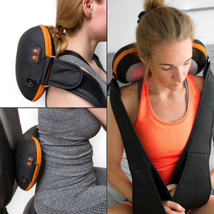A woman demonstrates the versatility of the Neck, Shoulder & Body Shiatsu Massager, using its black and orange heated design on her upper back, lower back, and shoulders while seated to showcase deep kneading relief.