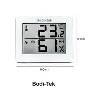 A Digital Room Thermometer and Hygrometer displays 23.2°C and 61% relative humidity. This compact device measures 100mm wide by 82mm tall.