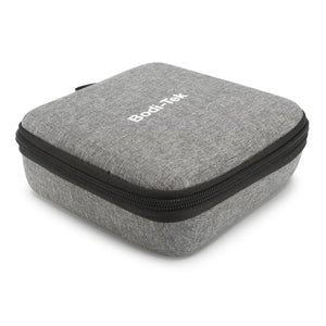 A square, grey fabric zippered case with Bodi-Tek printed in white on top, designed for portability and perfect for storing your Mini Deep Tissue Massage Gun. It features rounded edges and a black zipper around the sides.
