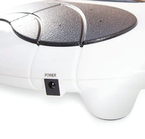 Close-up of the Circulation Plus Active Lower Leg & Foot Exerciser (2025), a white electronic muscle stimulator with a black textured top surface and a POWER-labeled input socket on the side.