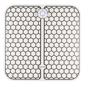 The Circulation Plus Boost & Revive Mat is a square electronic foot massager with a hexagonal grid, central O/M control button, and Bodi-Tek branding. It functions as a portable leg exerciser and muscle stimulator.