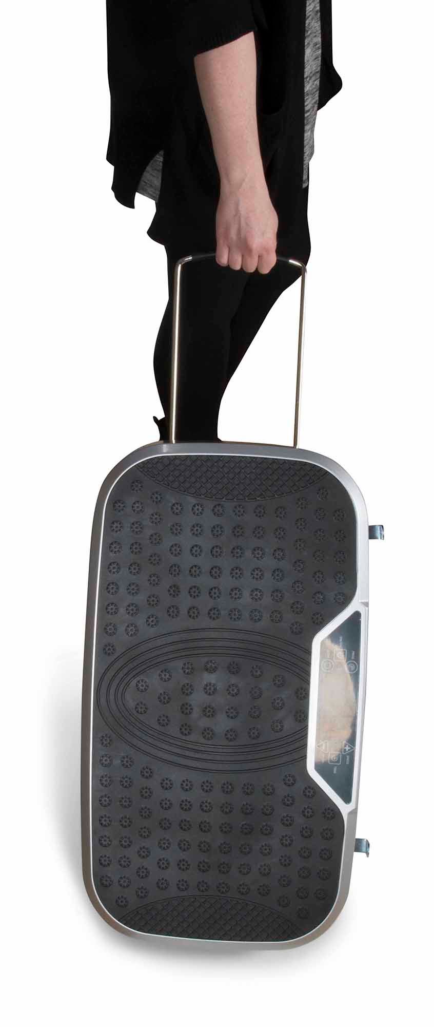 A person in black holds the handle of a textured, upright suitcase resembling the Whole Body Vibration Plate Training Gym, shown against a white background.