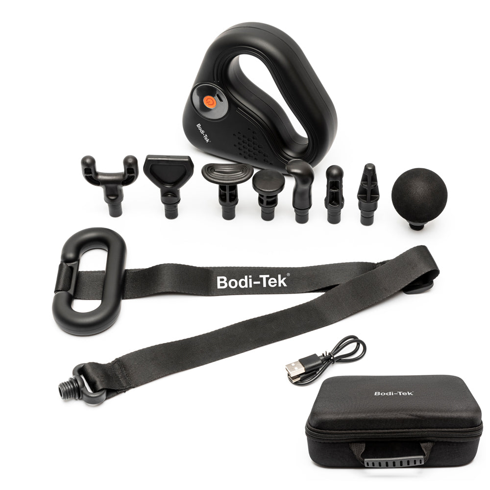The SPORTS PERCUSSION MASSAGE GUN WITH LATERAL ACTION BELT in black includes eight interchangeable heads, a carrying strap, USB charging cable, and compact storage case, all shown on a white background.