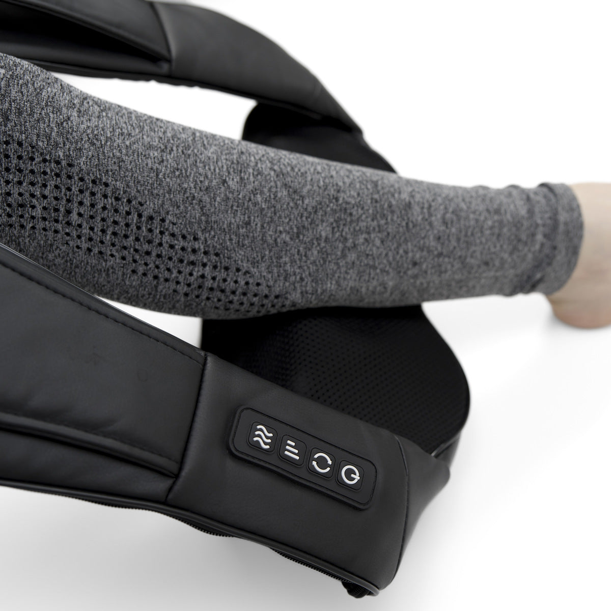 A person wearing a gray long-sleeve top uses the Neck & Shoulder Shiatsu Massager with control buttons and deep kneading action on their arm against a white background.