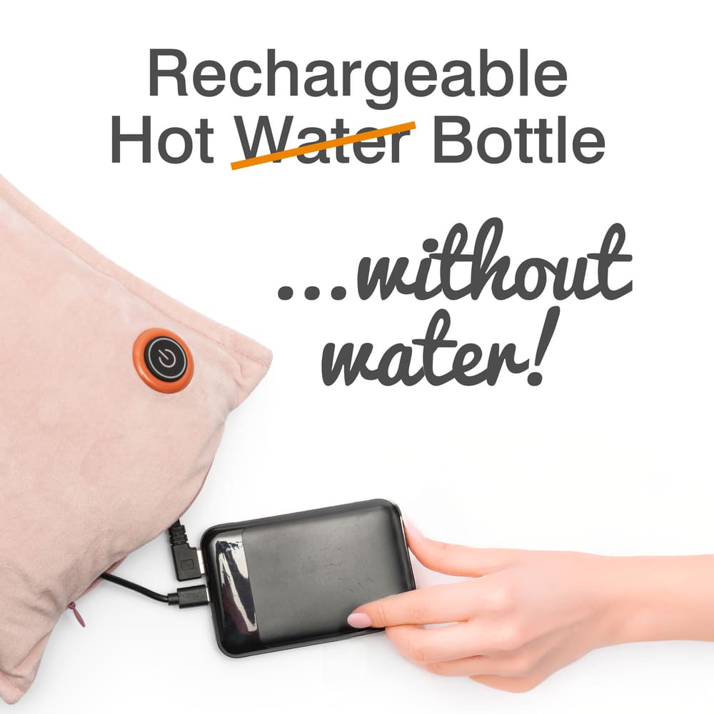 A hand connects a black power bank to the Cozy UNA Rechargeable Hot Water Bottle in pink with a power button. Text reads: "Rechargeable Hot Bottle ...without water!" ("water" crossed out). Enjoy wireless warmth anywhere!.