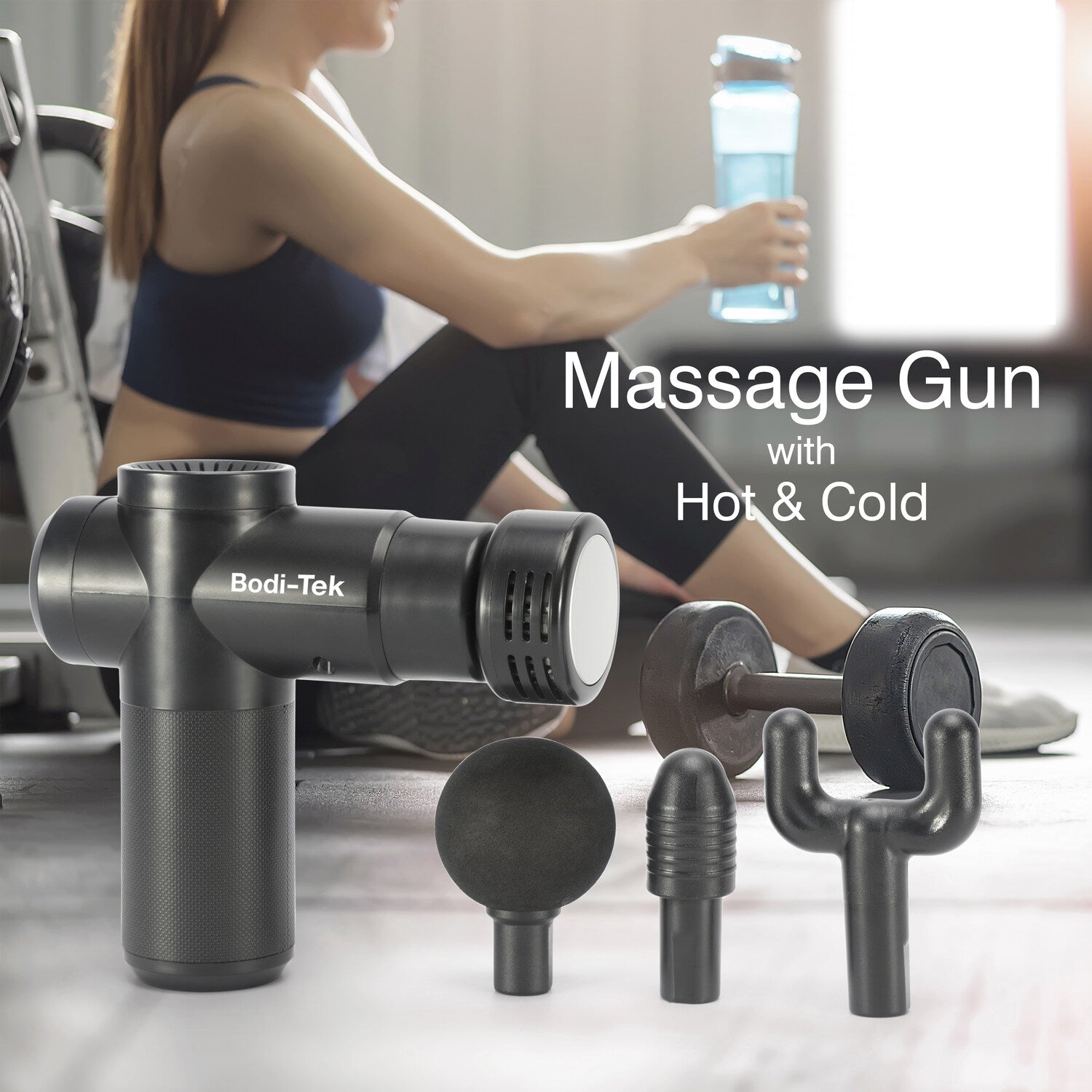 A Hot & Cold Deep Tissue Massager Gun with three attachments and a dumbbell are in the foreground. In the background, a woman in workout clothes holds a water bottle. Text reads: Massage Gun with Hot & Cold.