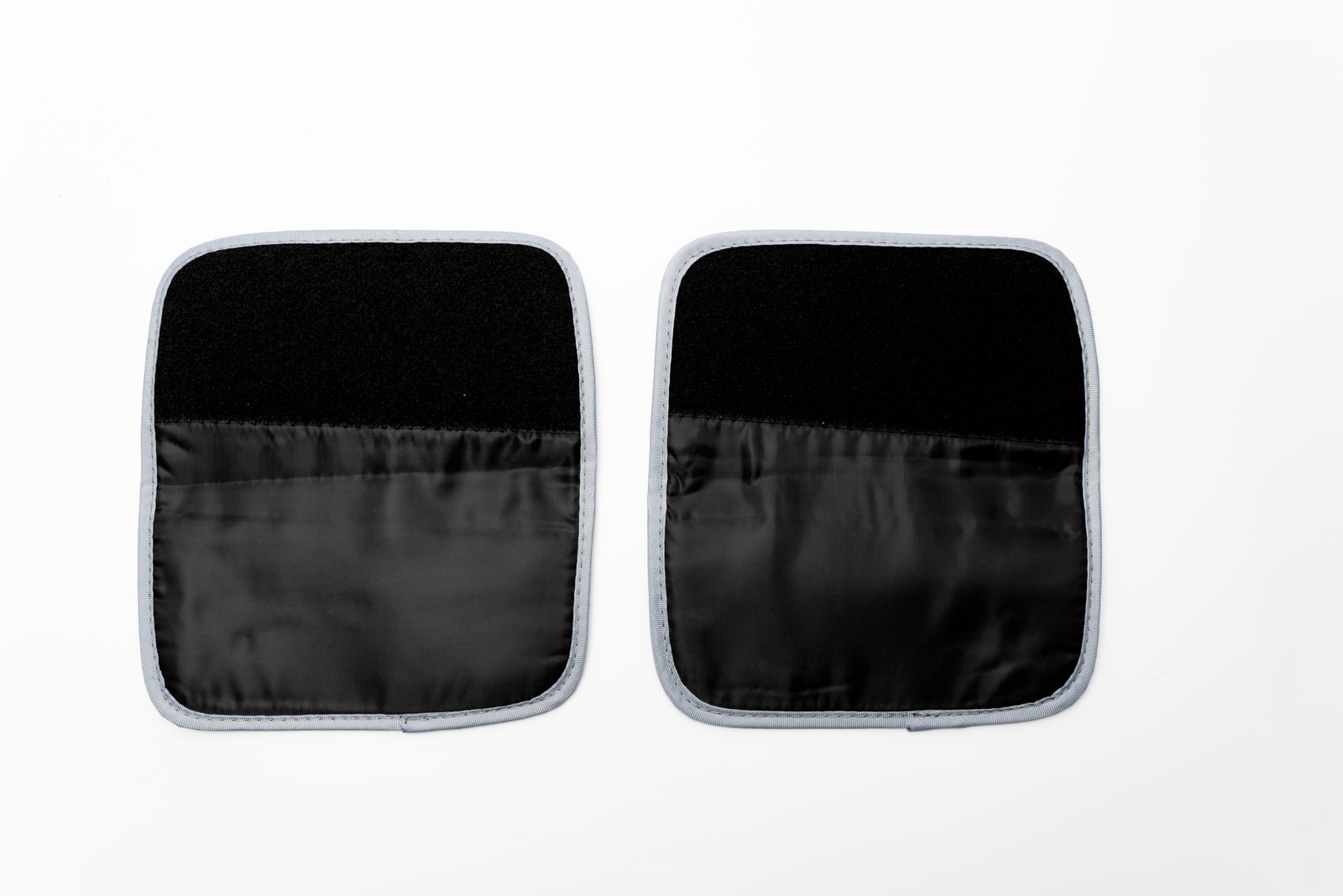 The COMFORT360° Air Compression Massager Boot Extension Straps are black and white cloth pads, ideal for extending the fit of your massager boots.