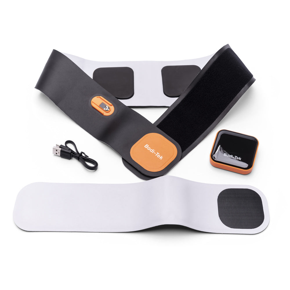 The Ab & Back Muscle Strengthener with heat features black and white adjustable straps, a compact black and orange control unit, and a USB charging cable, all displayed on a white background.