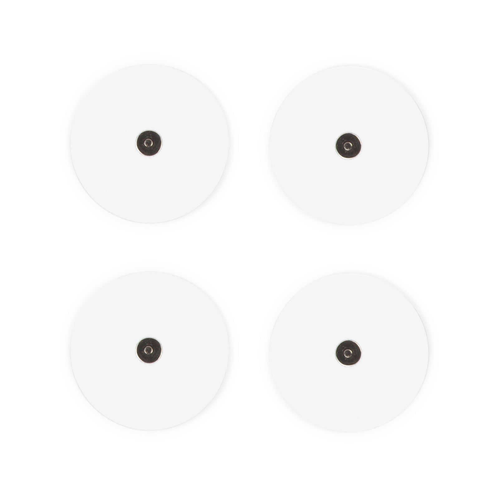 Four round, white QI Muscle Toner and Massager Gel Pads with small black centers are arranged in a square on a white background.