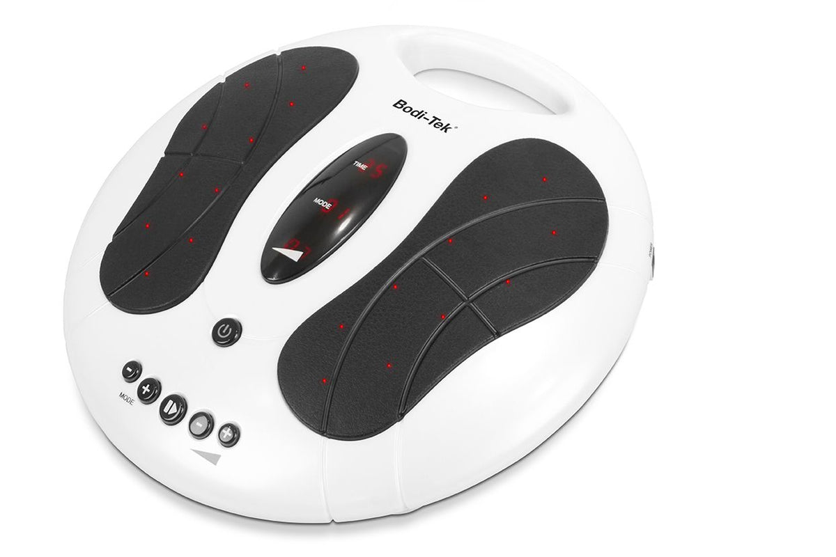 The Circulation Plus Active Lower Leg & Foot Exerciser (2025) is a white device with black foot pads, control buttons, a display screen, red indicator dots on the pads, a top handle, and serves as a circulation booster.